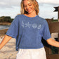 SEASHELLS ROW Cropped Mineral Washed Graphic Top: DENIM BLUE / M