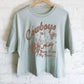 COWBOYS NEVER BRAKE MY HEART GRAPHIC LONG CROP TOP: Dusty mint