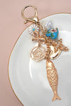 BAG CHARM-OCEAN PORCELAIN HEART FISH CROSS FLOWER | 80K064: Gold