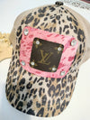 Leopard and leather hat